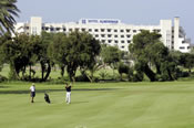 The golf course with hotel in the background